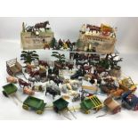 Collection of lead farmyard toys to include farm animals, figures, carts, fencing and trees etc,