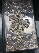 Hallmarked Silver and leather wallet, London 1991 maker RBB embossed with flowers