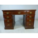 Pedestal desk with green leather top and three drawers under