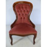 Pink upholstered wooden framed bedroom/nursing chair