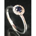 18ct white gold sapphire and diamond cluster ring