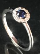 18ct white gold sapphire and diamond cluster ring