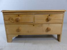 Small low pine Chest of drawers with one large and two small drawers