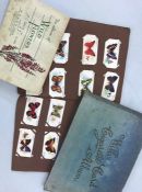 Three albums of cigarette cards to include Wills wild flowers etc