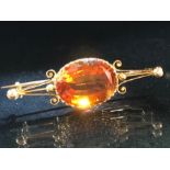 Gold and Citrine Brooch: Mid Victorian unmarked gold mount (possibly 18ct) with large Sherry Citrine