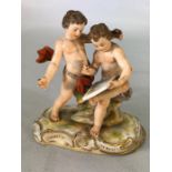 Meissen porcelain figurines of two boys painting, cross swords to base (A/F)