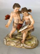 Meissen porcelain figurines of two boys painting, cross swords to base (A/F)