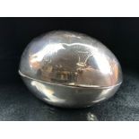 Silver Chester hallmarked 1911 solid silver egg with hinged lid and embossed decoration (total