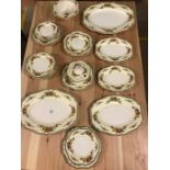 Quantity of John Maddock and Son Minerva pattern china to include platters, plates etc