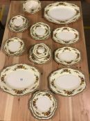 Quantity of John Maddock and Son Minerva pattern china to include platters, plates etc