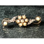 15ct Gold brooch set with seed pearls and a central Diamond (total weight approx 4.8g A/F)