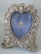 Silver hallmarked Photo Frame depicting birds and creatures with un-engraved heart shaped cartouche