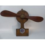 WWI Memorial plaque mounted propeller. Propeller with Crows Feet marking and letter 'A' above.