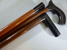 Three walking canes with Ebony handles