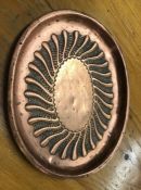 Copper tray with embossed pattern approx 27cm across