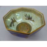 A Wedgwood lustre bowl of octagonal form. Decorated with dragons, factory marks and pattern number