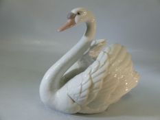 A Lladro blanc de chine figure of a swan printed mark verso impressed 5231