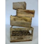 Three vintage wooden produce crates marked Pommery Champagne and Highgrove Covent Garden,
