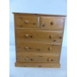 Pine chest of drawers, two small, three large