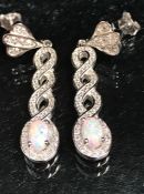 Pair of silver and CZ drop earrings with opal panels in the art deco style