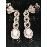 Pair of silver and CZ drop earrings with opal panels in the art deco style