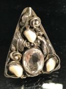 Arts and Crafts silver triangular shaped dress clip set with rock crystal and a central clear stone