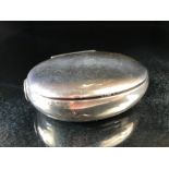 Silver Oval tobacco / snuffbox c1690 with squeeze/ pinch opening design and makers mark to inner