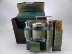 Gentlemans leather cased (A/F) travelling companion of bottles, mirror and brush with original key