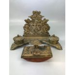 Brass writing companion set comprising of combined inkwells & letter rack and a brass blotter (