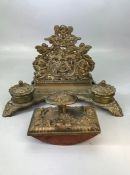 Brass writing companion set comprising of combined inkwells & letter rack and a brass blotter (