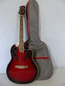 Roundback Electro Accoustic 6 string guitar made by Gear4music, with soft case.