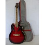 Roundback Electro Accoustic 6 string guitar made by Gear4music, with soft case.