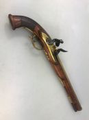 Flintlock long barrelled pistol with carved chequered grip, unusual barrel (approx 32cm) with