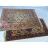 Two small ground rugs. Approx. dimensions 93cm x 180cm and 130cm x 187cm
