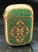 Brass and enamel set vesta case