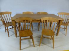 Pine farmhouse kitchen table with turned legs approx dimensions 182cm x 92cm, along with six pine