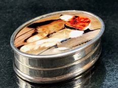 Silver and enamel lidded pill box depicting a dog