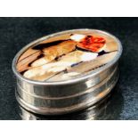 Silver and enamel lidded pill box depicting a dog