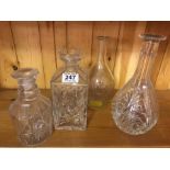 Group of four cut glass decanters (no stoppers)