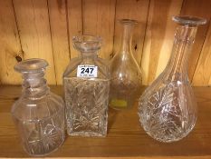 Group of four cut glass decanters (no stoppers)