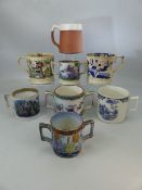 A collection of mostly 19th century transfer-printed pottery cider mugs, three twin-handled