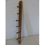 Early oak rustic wall-mounted coat and hat hanger
