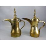 Two Turkish brass coffee pots, stamped maker's marks, height approx 33cm