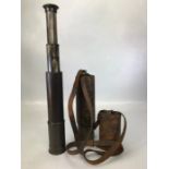 A LEATHER MOUNTED FOUR DRAW TELESCOPE by Ross of London No. 28321, in leather case