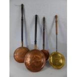 Three copper and one brass bed pans