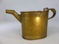 Small brass watering can