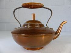 Copper kettle with turned wooden handle