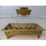 Ornate metalwork inkwell and brass desk tidy