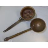 Two copper moulded pans