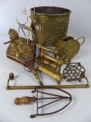 Collection of brass items to include fire dogs, towel rails etc.